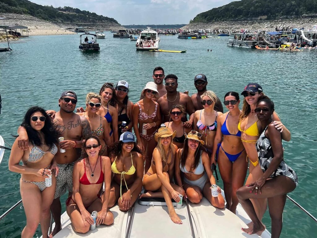 Large group on a boat celebrating on Lake Austin