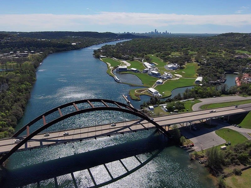 Austin bridge over the water with a boat