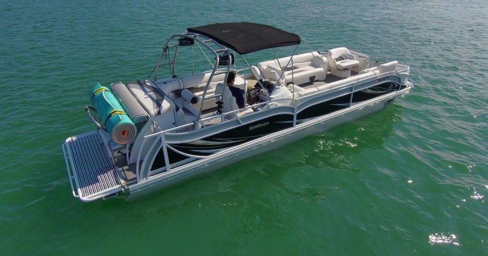 Luxury black boat cruising on Lake Travis