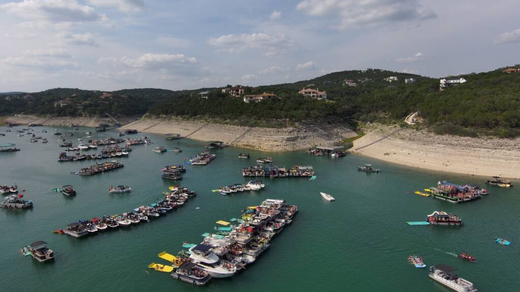 Group of people on a boat enjoying the water